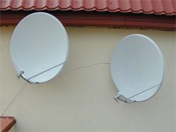 In the picture below are two 90-cm Hotbird satellite dishes, Akademika Anokhina Street, Moscow:      